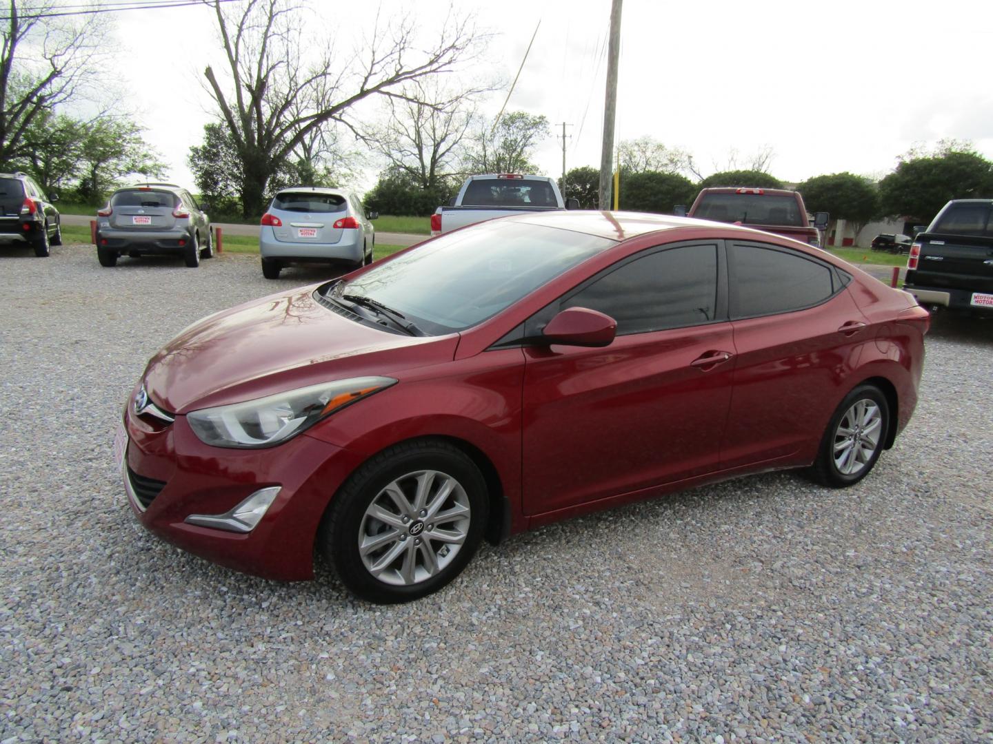 2016 Red /Gray Hyundai Elantra Limited (5NPDH4AE2GH) with an 1.8L L4 DOHC 16V engine, Automatic transmission, located at 15016 S Hwy 231, Midland City, AL, 36350, (334) 983-3001, 31.306210, -85.495277 - Photo#2